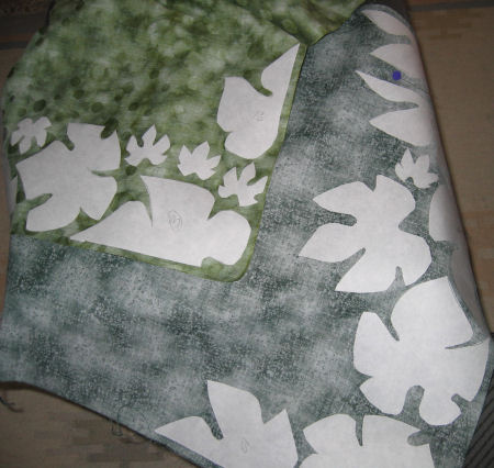Fusible web on backs of leaf fabrics