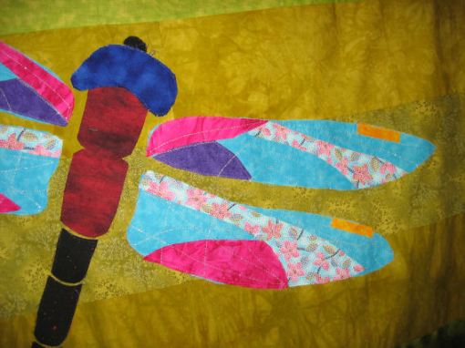 Applique pieces stitched down with monofilament