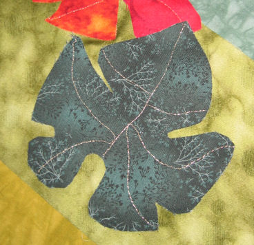 Grape leaf with gold metallic thread veins