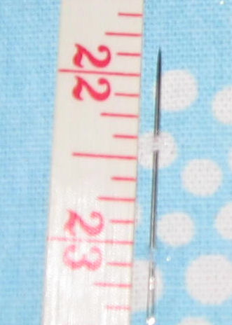 Needle on ironing board with 1/2" gap