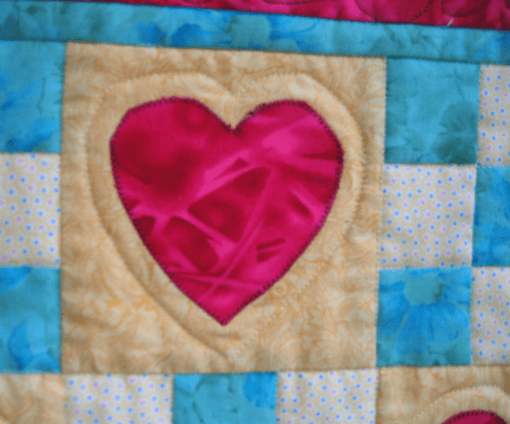 Detail of Blanket of Love quilt