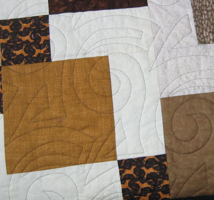 Back of quilt showing quilting Back of quilt showing quilting