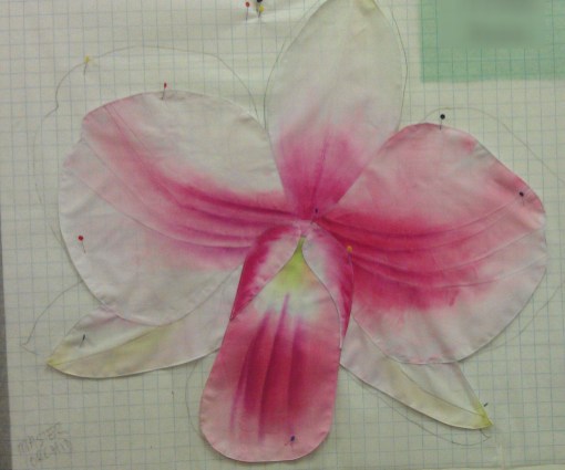 Pieces machine basted and laid out ready for stitching together