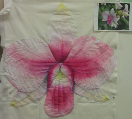 After initial outline stitching/stitch in the ditch in invisible thread