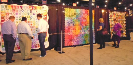 It's not often you see a group of men inspecting a Dear Jane quilt
