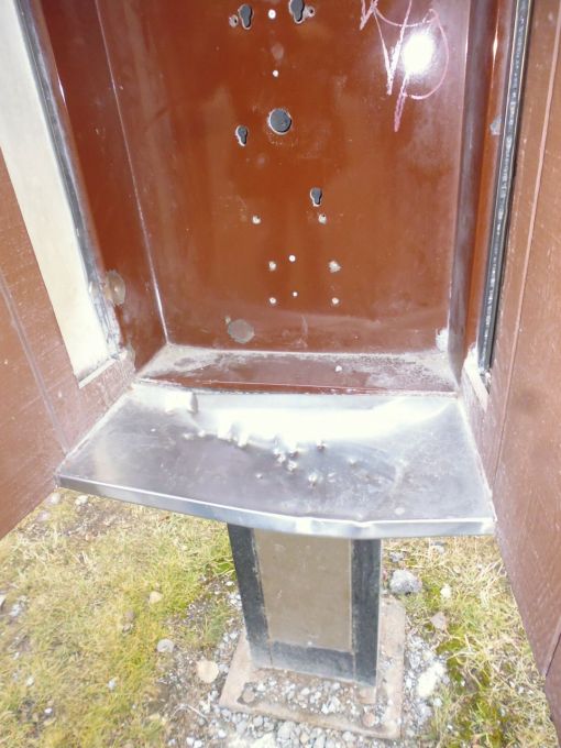 Grizzly bear claw marks on the silver metal