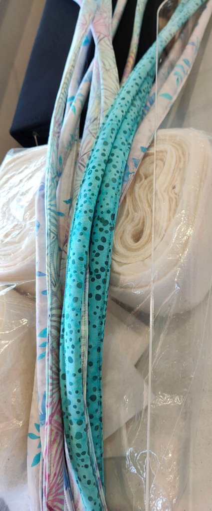 The first few strips - for a rectangular rug, you stitch each strip separately. You don't join the ends of each strip to the next one