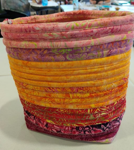 The finished container with the top turned over for stability.