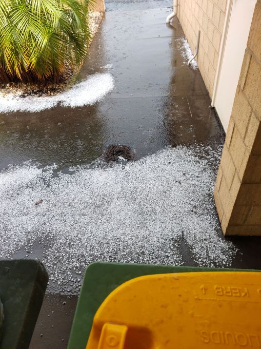 This soakwell just couldn't cope with the deluge, so the water and hailstones pooled there for several minutes. The water here was about 6 cm deep.