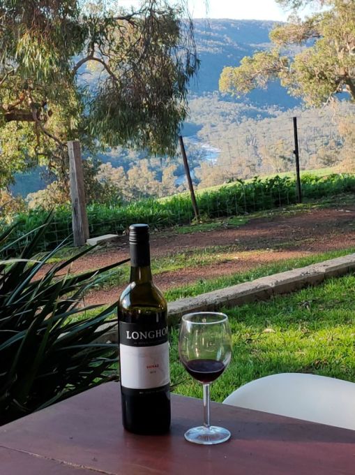 drinks on the veranda in the late afternoon, overlooking the green valley down to the Avon River
